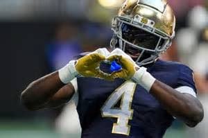 Jeremiyah Love in Notre Dame uniform during a football game
